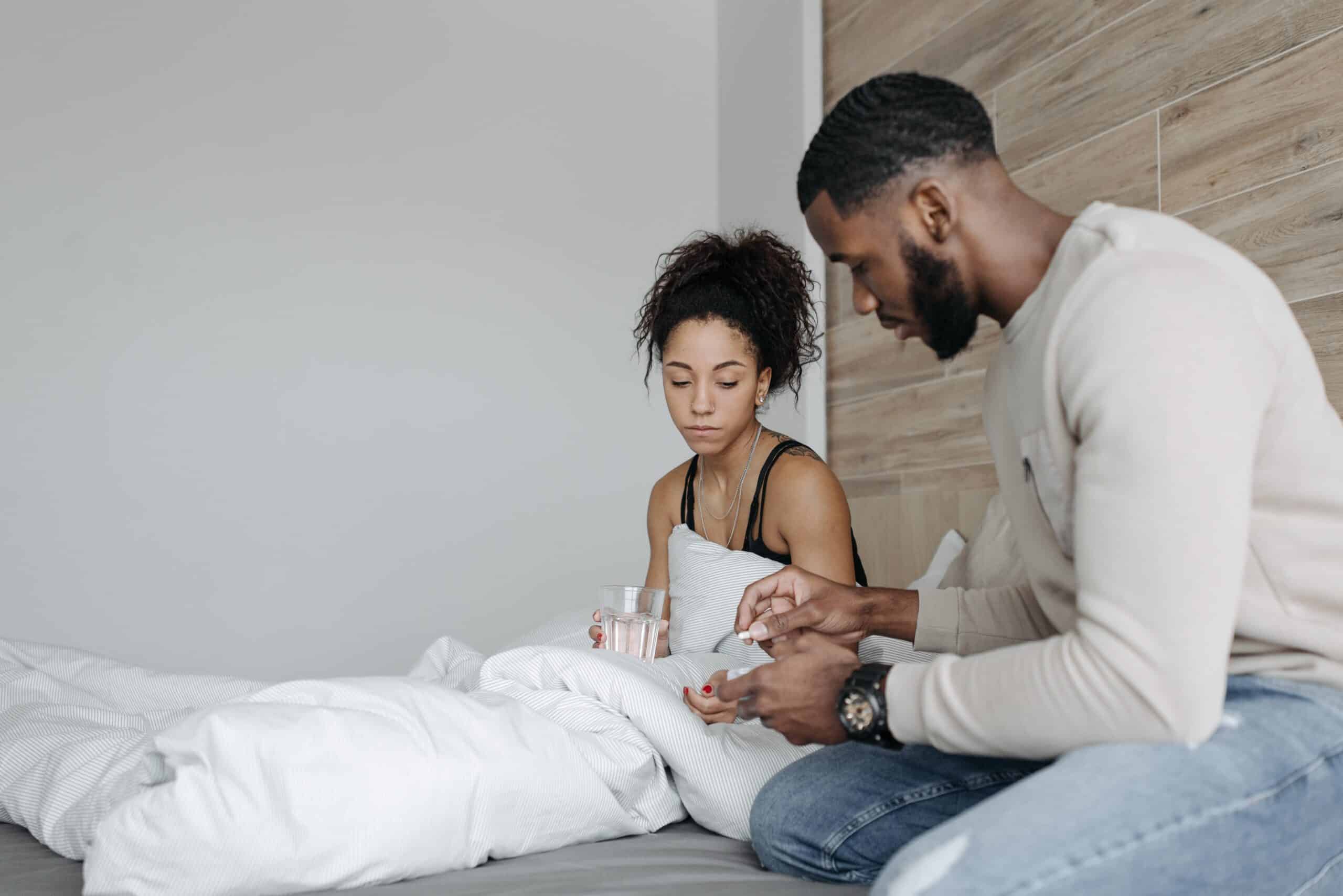 man and women taking meds